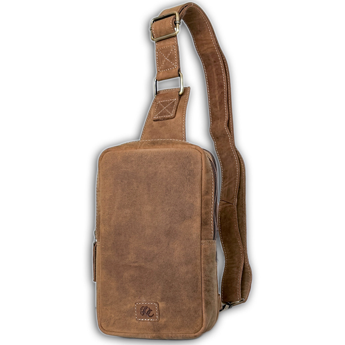 Brown full-grain leather sling bag for everyday carry with concealed carry pocket