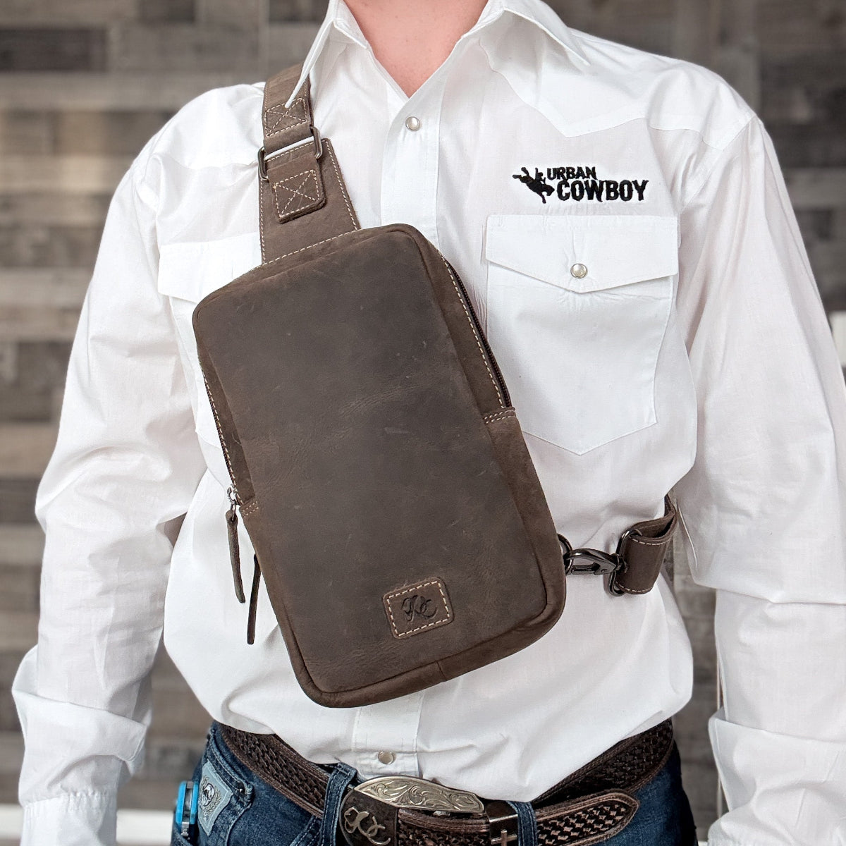 UC Leather dark brown CCW sling bag with hidden concealed carry pocket